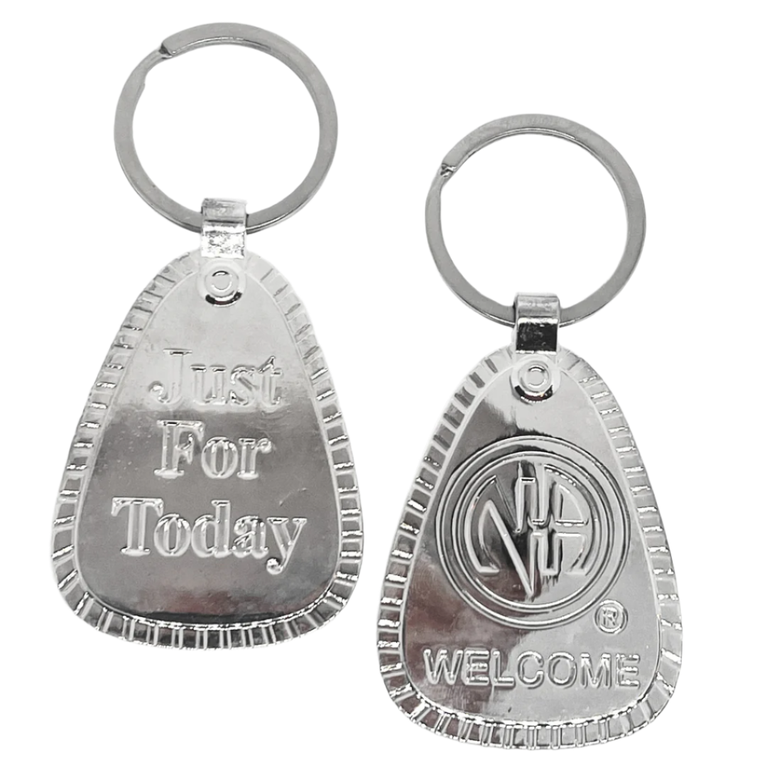 G064. Key Chain: NA Silver Metal - Choices Books & Gifts