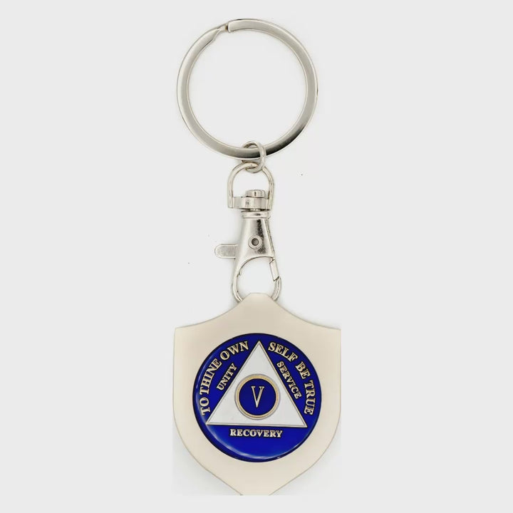 G045 Silver Shield keychain medallion holder spinning to show front and Serenity Prayer back