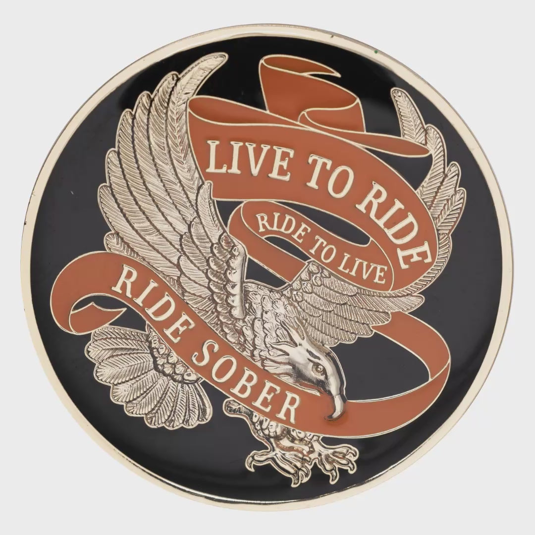 Live To Ride recovery medallion spinning to show front and back