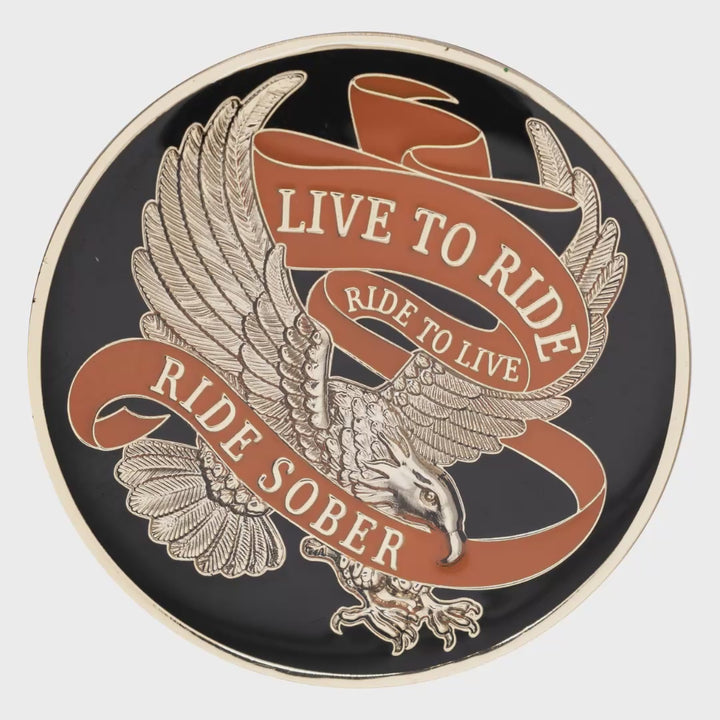 Live To Ride recovery medallion spinning to show front and back