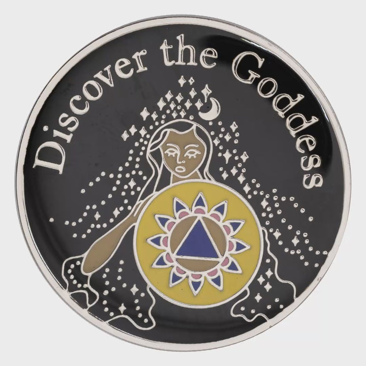 Discover the Goddess recovery coin spinning to show front and back