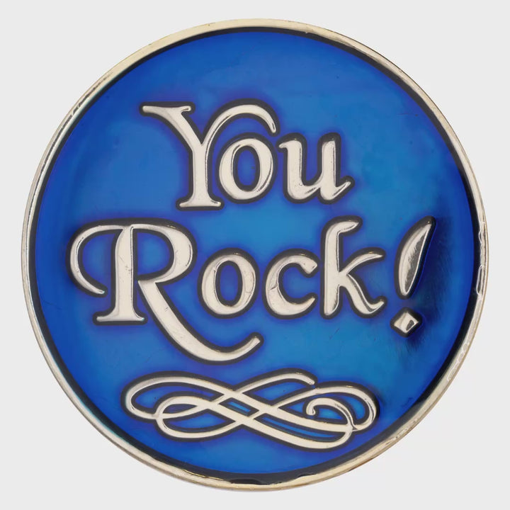 You Rock recovery medallion spinning to show front and back