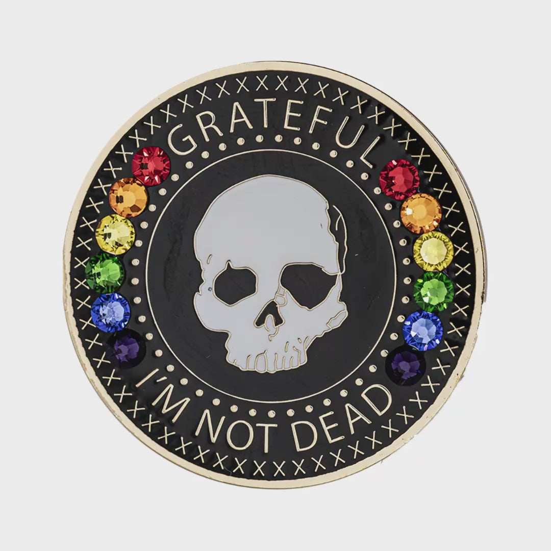 Grateful I'm Not Dead rainbow recovery coin spinning to show front and back