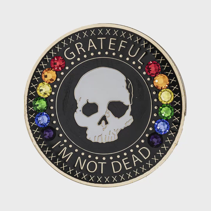Grateful I'm Not Dead rainbow recovery coin spinning to show front and back